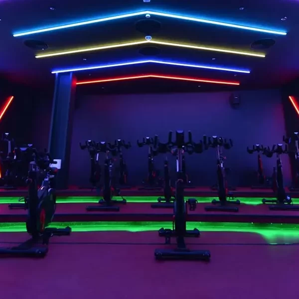 Vibrant and energetic lighting design in a Gym with RGB LED strip lights in Dubai, UAE