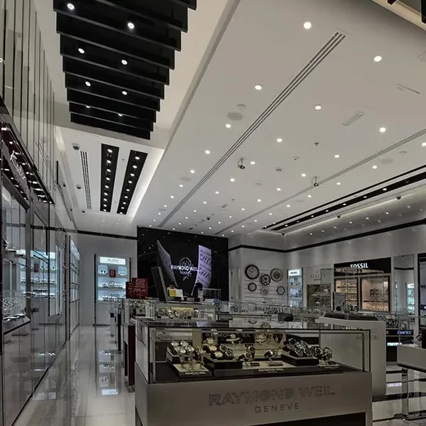 Professional lighting design of a watch retail store featuring premium downlights in Dubai, UAE